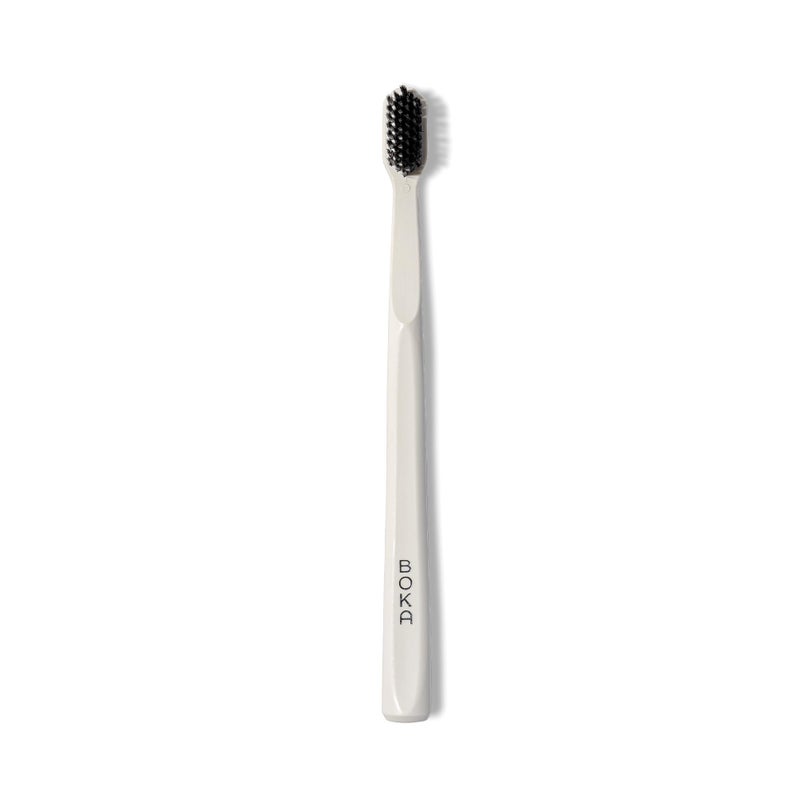 Boka Classic Manual Toothbrush with Extra Soft Activated-Charcoal, Tapered Bristles, Bioplastic Handle That Includes Travel Cap, Dentist-Approved, Great for Adults and Kids, White (Pack of 1) - Image 1